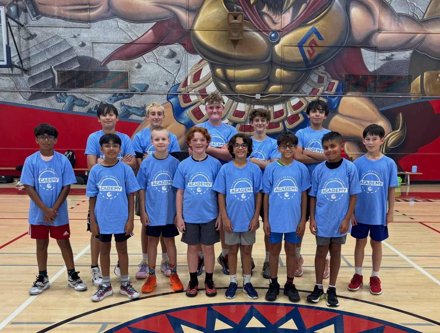 Rising Tide boys group in blue shirts